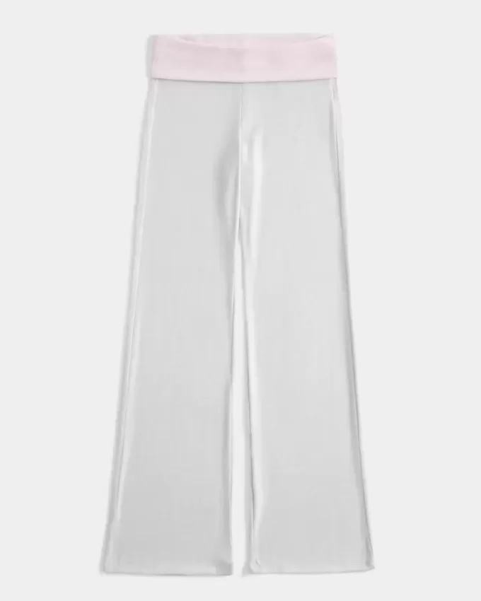 Pantaloni a zampa in maglia con risvolto in vita