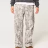 Pantaloni cargo mimetici super larghi