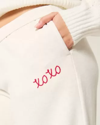 Pantaloni della tuta a gamba larga con grafica XOXO