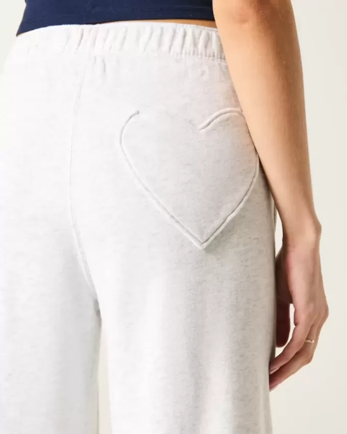 Pantaloni della tuta a gamba larga con tasca a cuore