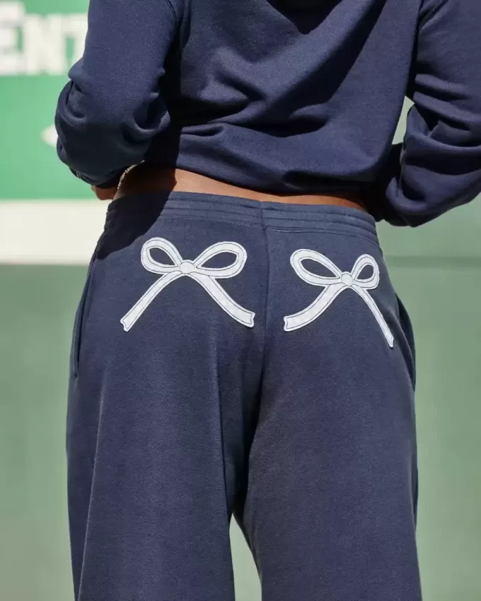 Pantaloni della tuta larghi con grafica a fiocco