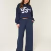 Pantaloni della tuta larghi con grafica a fiocco