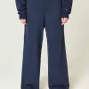 Pantaloni della tuta larghi con grafica a fiocco