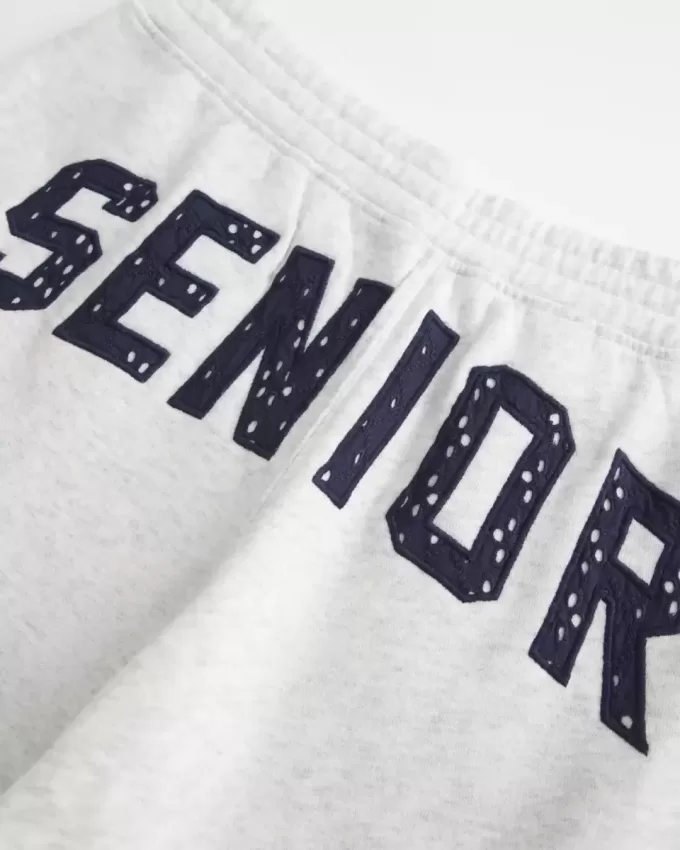 Pantaloni della tuta larghi con grafica senior