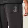 Pantaloni della tuta larghi con stampa serpente