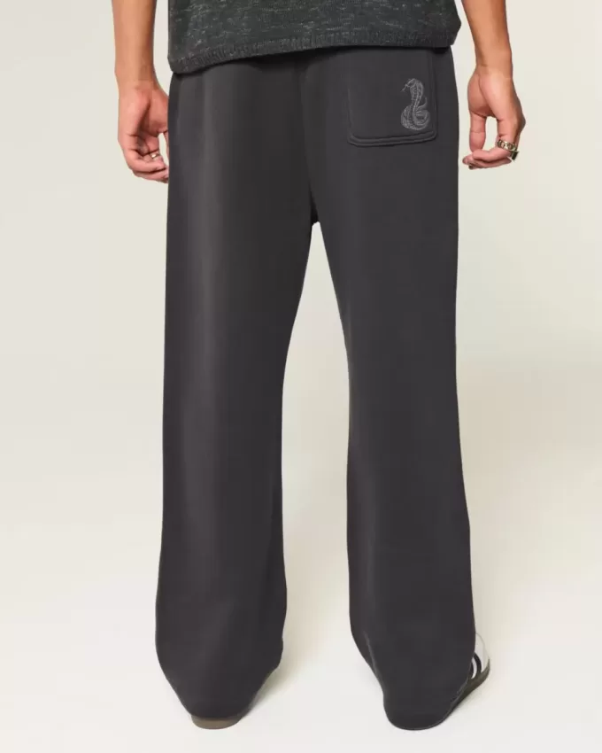 Pantaloni della tuta larghi con stampa serpente