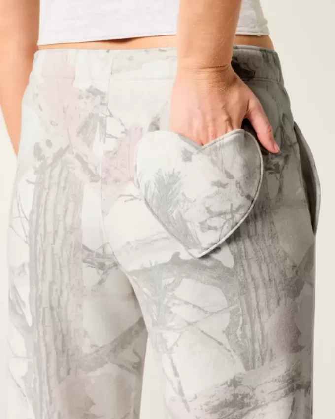 Pantaloni della tuta mimetici a gamba larga con tasca a cuore