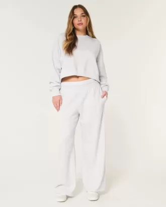 Pantaloni larghi in pile con logo in vita