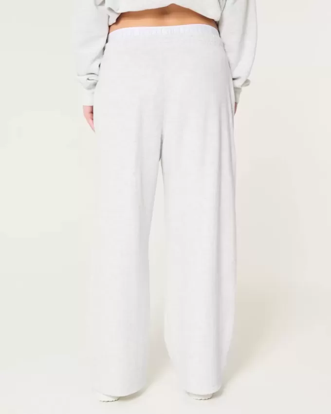 Pantaloni larghi in pile con logo in vita