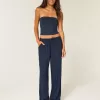 Jeans larghi a vita alta con lavaggio medio