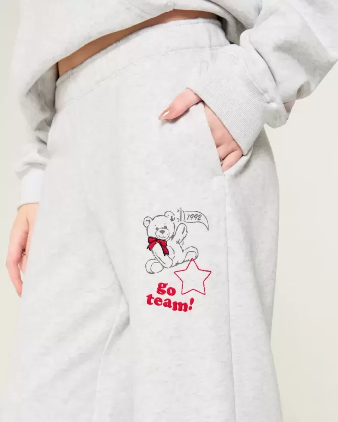 Pantaloni sportivi a gamba larga con grafica