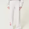 Pantaloni sportivi a gamba larga con grafica