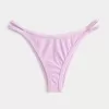 Slip bikini a sgambatura alta con spalline sottili