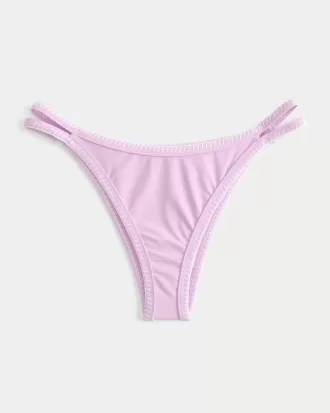Slip bikini a sgambatura alta con spalline sottili