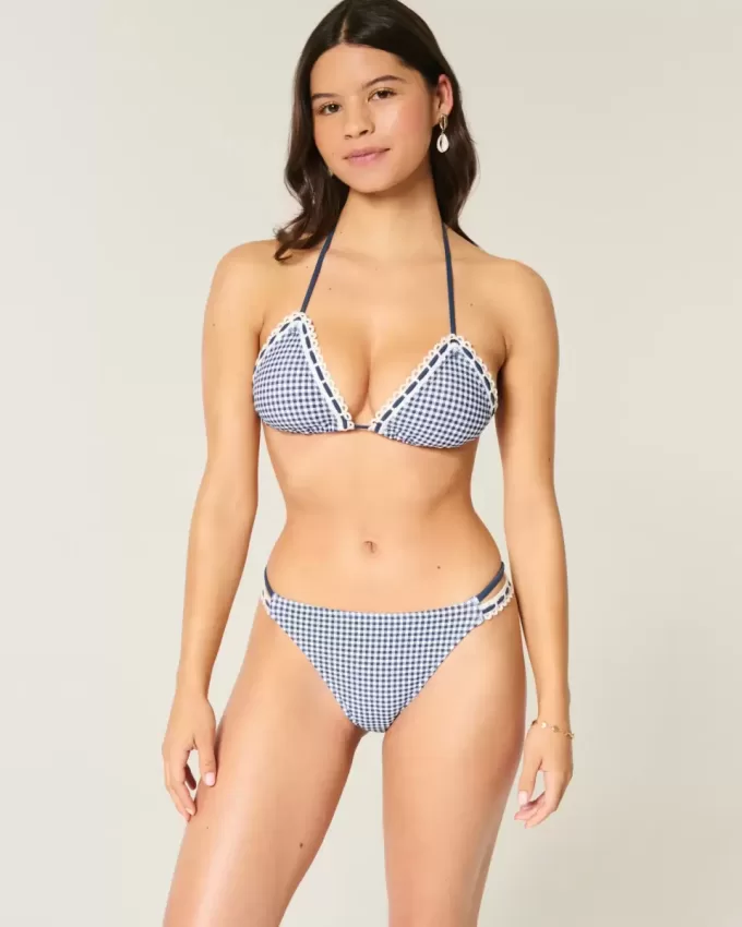 Slip bikini aderente con doppio cinturino e finiture in stile uncinetto Slip bikini aderente con doppio cinturino e finiture in stile uncinetto