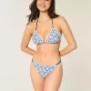 Slip bikini aderente con doppio cinturino e finiture in stile uncinetto Slip bikini aderente con doppio cinturino e finiture in stile uncinetto