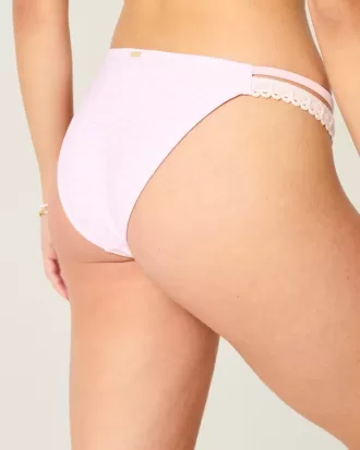 Slip bikini aderente con doppio cinturino e finiture in stile uncinetto
