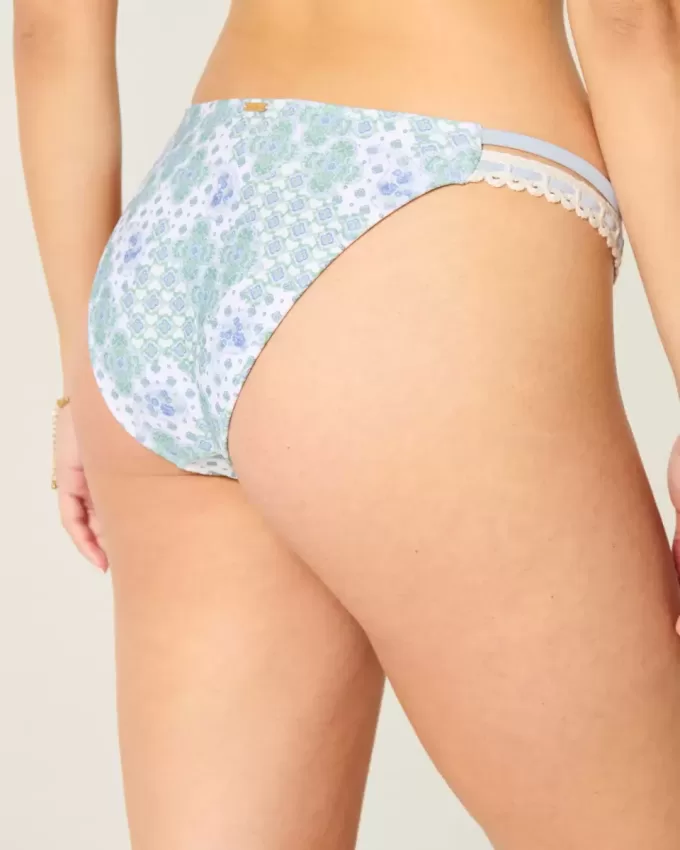 Slip bikini aderente con doppio cinturino e finiture in stile uncinetto Slip bikini aderente con doppio cinturino e finiture in stile uncinetto