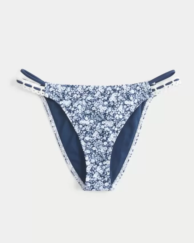 Slip bikini aderente con doppio cinturino e finiture in stile uncinetto Slip bikini aderente con doppio cinturino e finiture in stile uncinetto