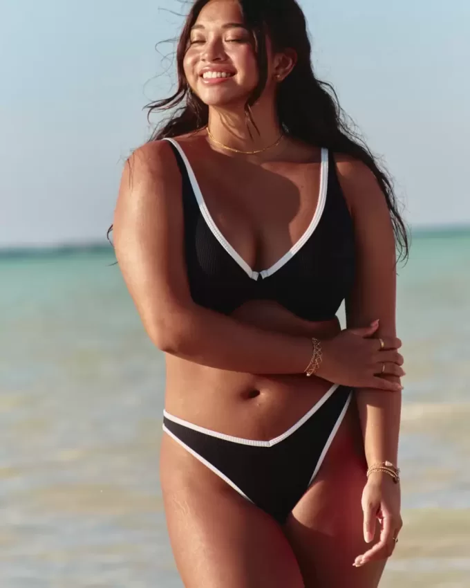 Slip bikini Cheekiest a vita alta con sgambatura a coste e vita a V