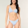 Slip bikini Cheekiest con occhielli e sgambatura alta