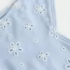 Slip bikini Cheekiest con occhielli e sgambatura alta