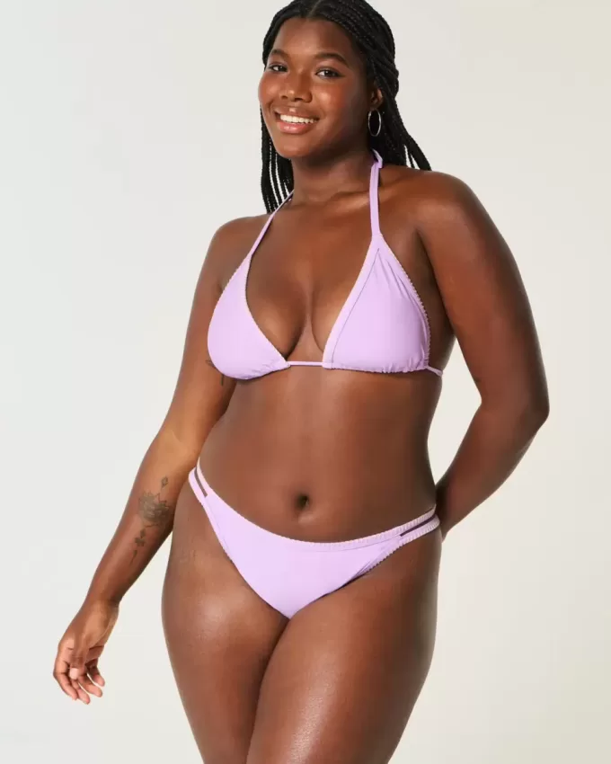 Slip bikini Cheekiest con sgambatura alta e cinturini ricamati Slip bikini Cheekiest con sgambatura alta e cinturini ricamati