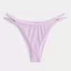 Slip bikini Cheekiest con sgambatura alta e cinturini ricamati Slip bikini Cheekiest con sgambatura alta e cinturini ricamati