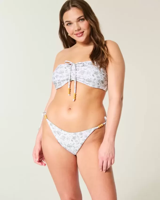 Slip bikini Cheeky reversibile con lacci laterali