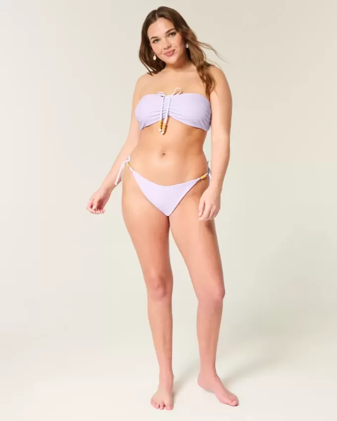 Slip bikini Cheeky reversibile con lacci laterali Slip bikini Cheeky reversibile con lacci laterali