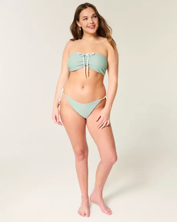 Slip bikini Cheeky reversibile con lacci laterali