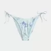 Slip bikini sfacciato con lacci laterali e finiture all’uncinetto