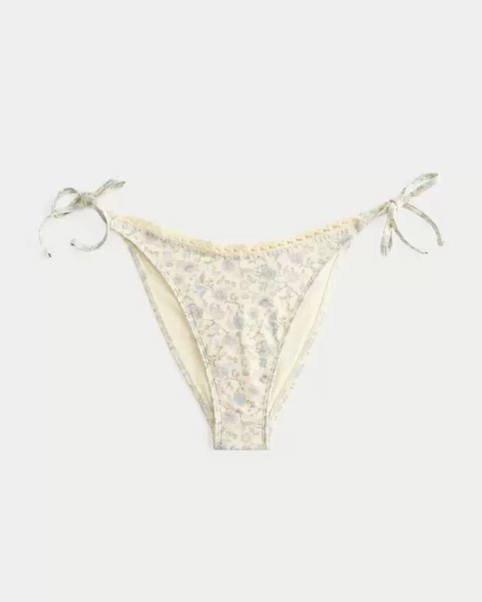 Slip bikini sfacciato con lacci laterali e finiture all’uncinetto