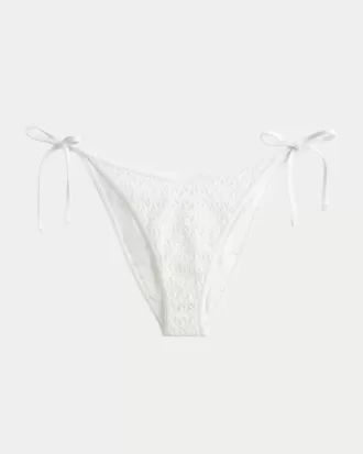 Slip bikini sfacciato con lacci laterali in stile uncinetto con paillettes