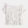 T-shirt mimetica con lacci e spalle scoperte