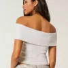 Top a coste con spalle scoperte e risvolto