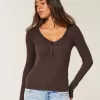 Top a maniche lunghe con pizzo