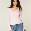 Top a maniche lunghe con pizzo