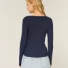 Top a maniche lunghe con pizzo