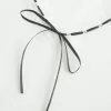 Top a maniche lunghe con pizzo