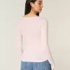 Top a maniche lunghe con pizzo