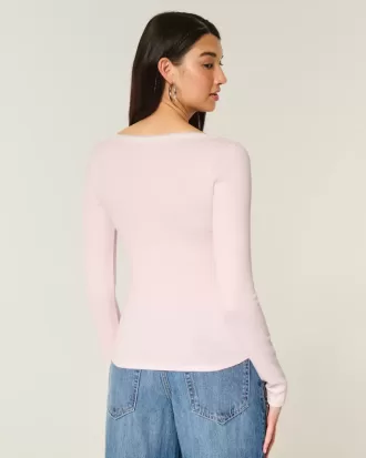 Top a maniche lunghe con pizzo