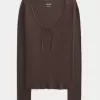 Top a maniche lunghe con pizzo