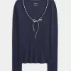 Top a maniche lunghe con pizzo