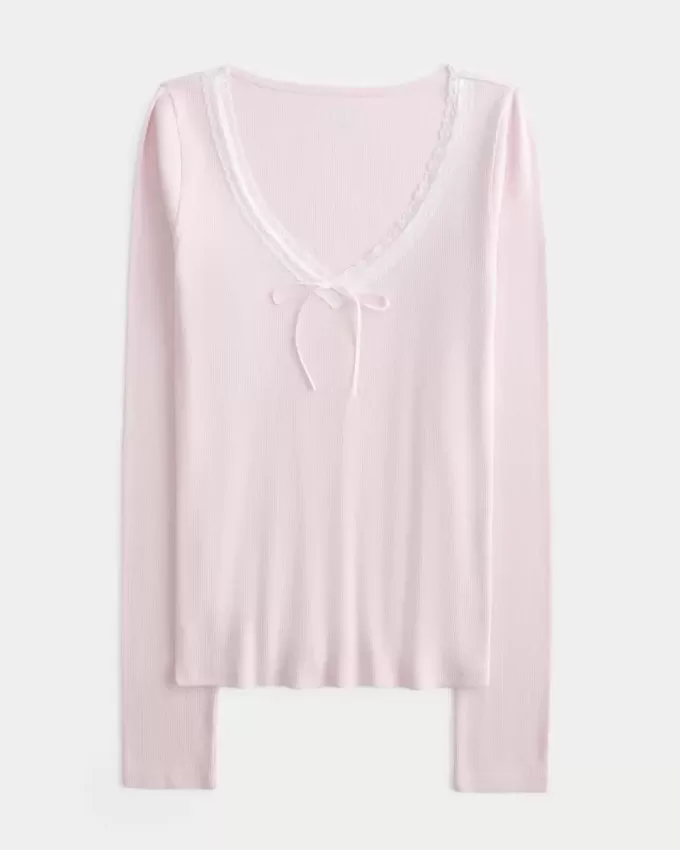 Top a maniche lunghe con pizzo