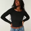 Top a maniche lunghe con scollo a V