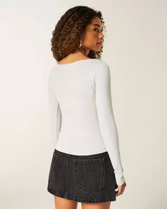 Top a maniche lunghe con scollo a V
