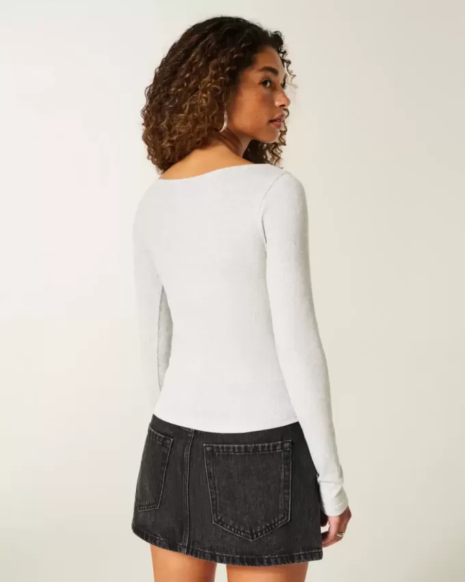 Top a maniche lunghe con scollo a V Top a maniche lunghe con scollo a V