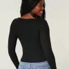Top a maniche lunghe con scollo a V