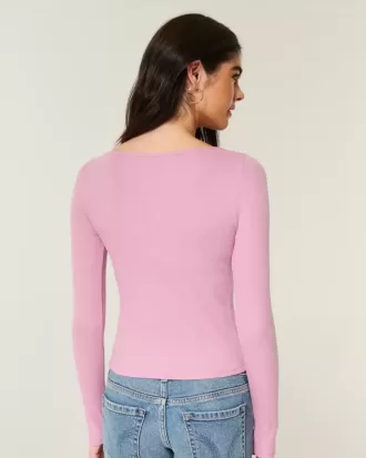 Top a maniche lunghe con scollo a V